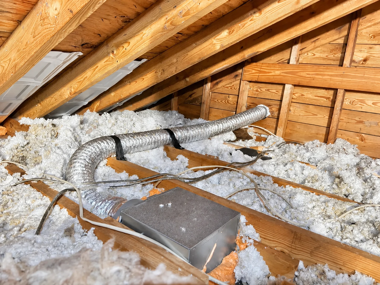 Bathroom exhaust flex duct stretched in a straight run toward exterior wall