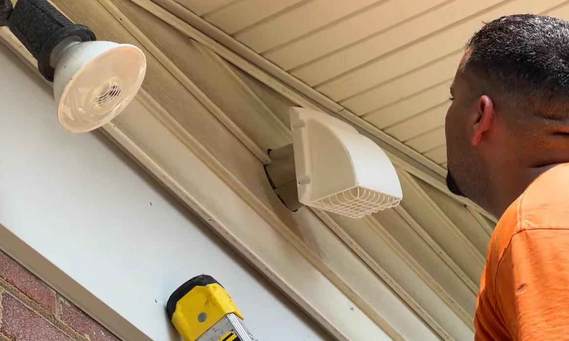 Bathroom exhaust duct connected to a dedicated gable-wall exterior terminal