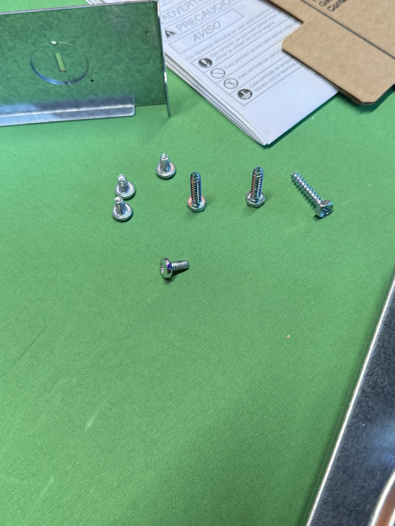 Six screws supplied with the Panasonic Whisper Mighty fan arranged by type